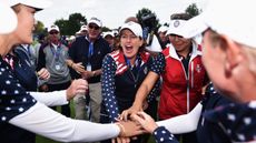 US captain Juli Inkster celebrates with the US team after the 2015 win in the Solheim Cup