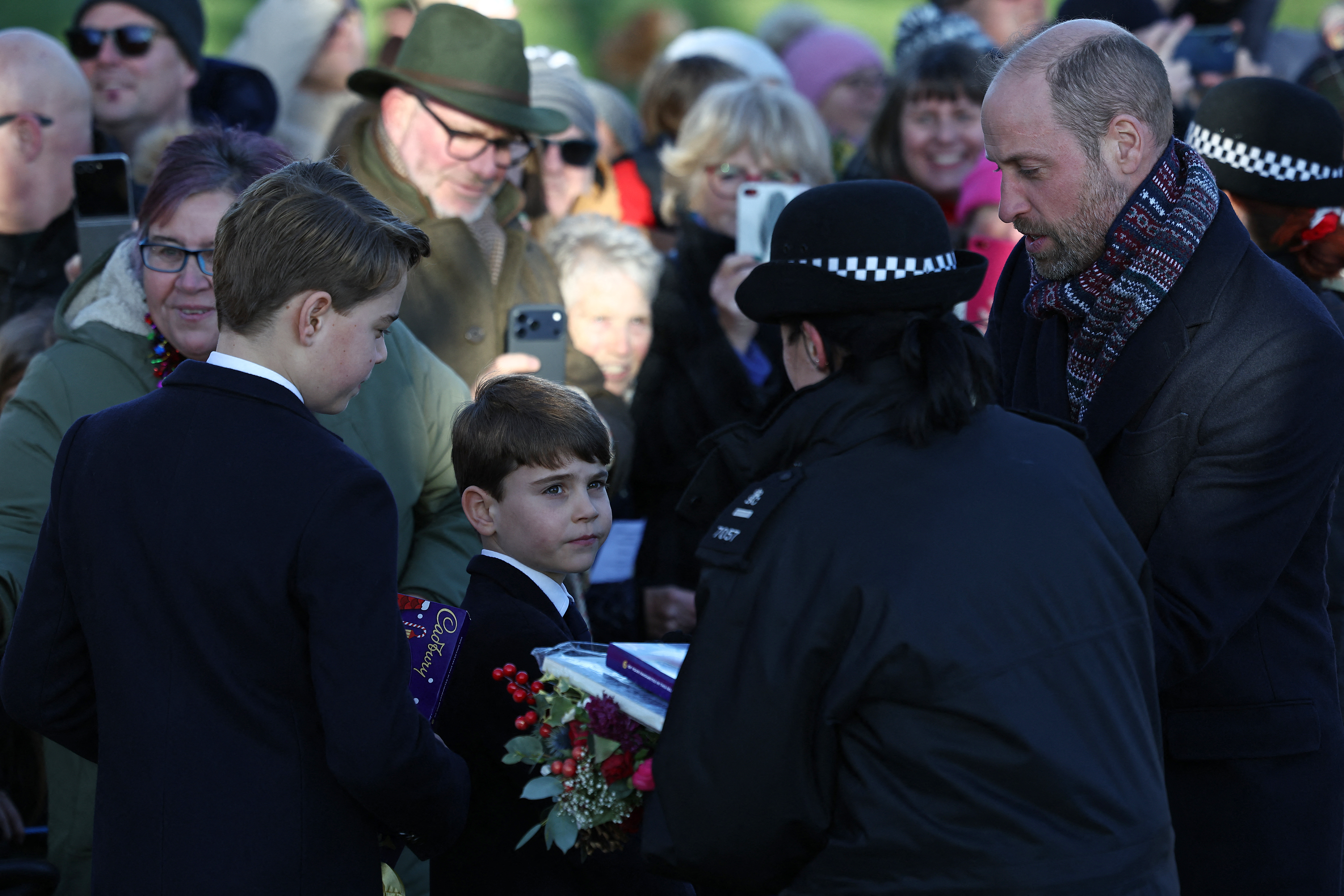 Prince George and Prince Louis greeting fans on Christmas