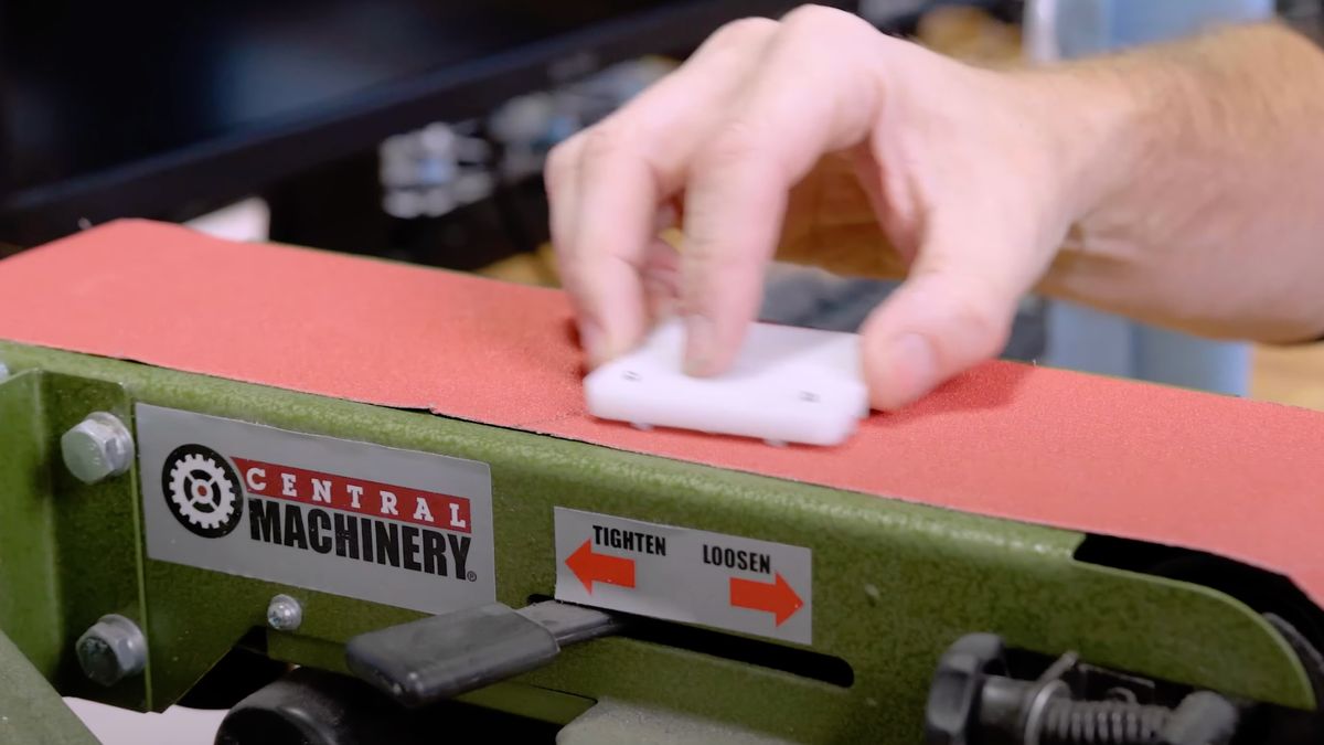 JayzTwoCents grinding down a CPU on a sander. 