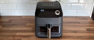 The Kyvol AF600 Air Fryer on a kitchen countertop