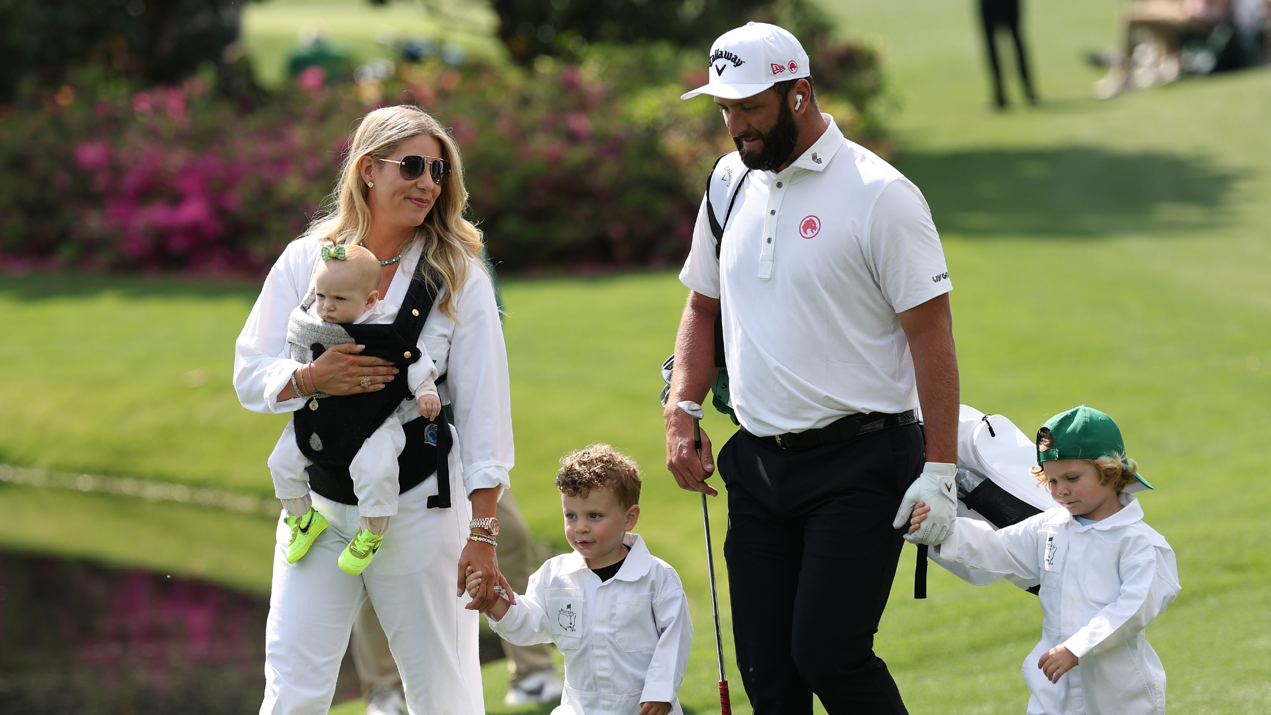 Kelly Cahill, Jon Rahm and their family at the Masters Par-3 Contest