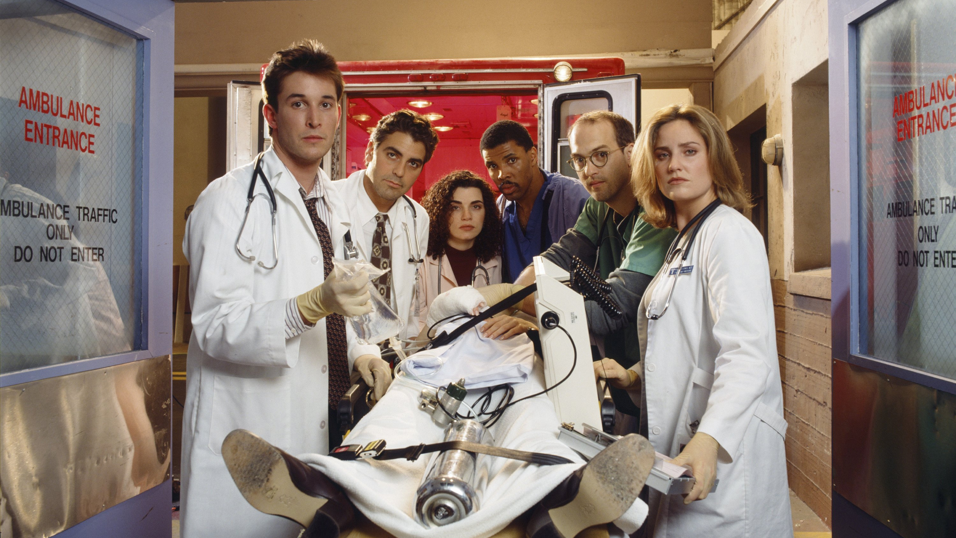 (l-r) Noah Wyle as Doctor John Carter; George Clooney as Doctor Doug Ross; Julianna Margulies as Nurse Carol Hathaway; Eriq La Salle as Doctor Peter Benton; Anthony Edwards as Doctor Mark Greene; Sherry Stringfield as Doctor Susan Lewis