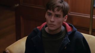 Robert Sean Leonard seated and looking up in Dead Poets Society.