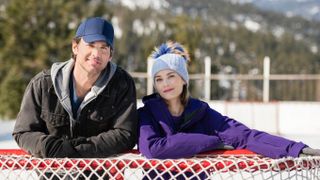 Kevin McGarry and Kim Matula next to a hockey net in Checkin' It Twice