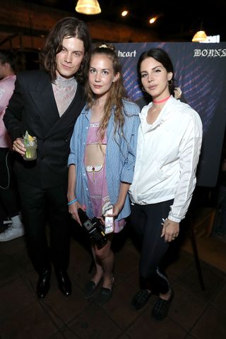 Singer Borns, photographer Caroline Grant and singer Lana Del Rey attend BORNS Single Release Event at Highland Park Bowl on July 27, 2017 in Los Angeles, California