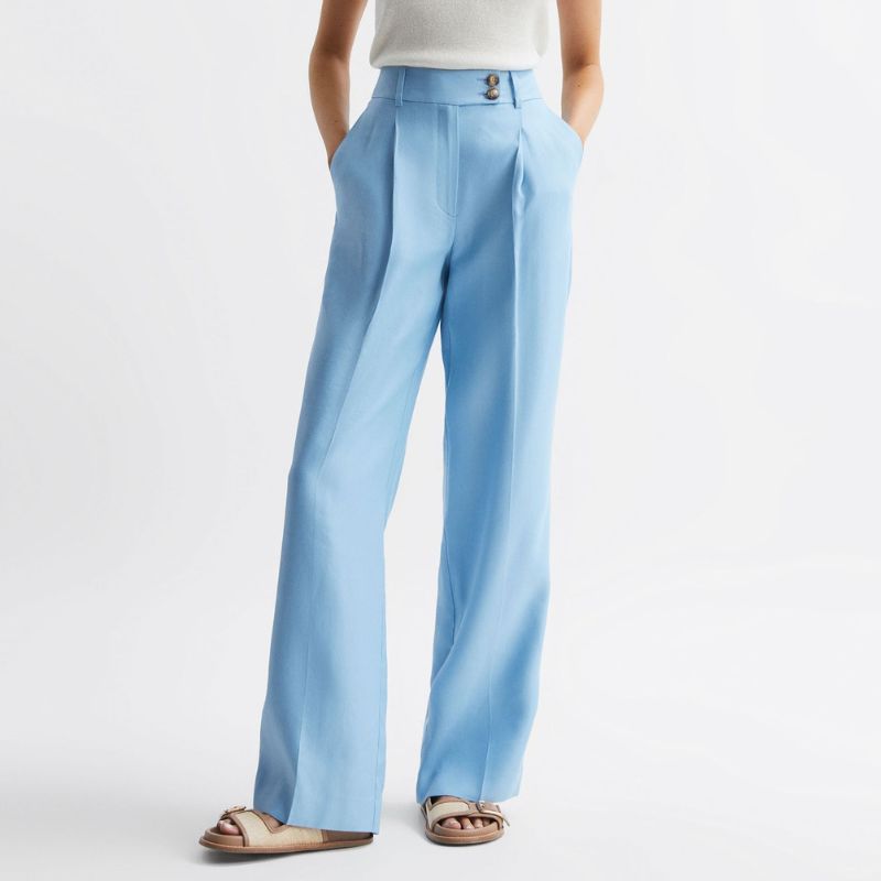 model wearing Reiss Blue Linen Trouser