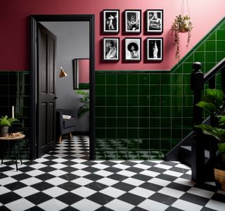 green wall tiling in pink hallway
