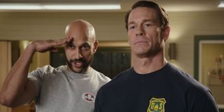 Playing With Fire Keegan-Michael Key and John Cena stand authoritatively