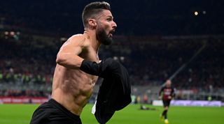 AC Milan striker Olivier Giroud celebrates by removing his shirt after scoring his team's winning goal in the Serie A match between AC Milan and Spezia on 5 November, 2022 at the San Siro, Milan, Italy