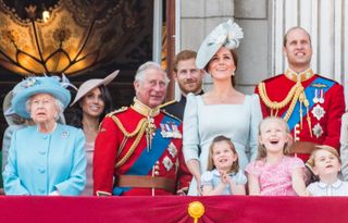 Queen Elizabeth II, Meghan, Duchess of Sussex, Prince Charles, Prince of Wales, Prince Harry, Duke of Sussex, Catherine, Duchess of Cambridge, Princess Charlotte of Cambridge, Savannah Phillips, Prince William, Duke of Cambridge and Prince George of Cambridge on the balcony of Buckingham Palace