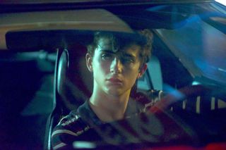 timothee chalamet driving a car in the movie hot summer nights