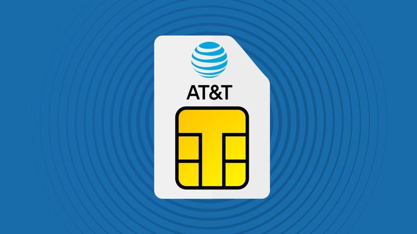A SIM card bearing the AT&amp;T Logo set against a blue swirly background