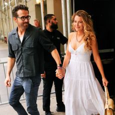 Blake Lively and Ryan Reynolds walk down the street in New York City