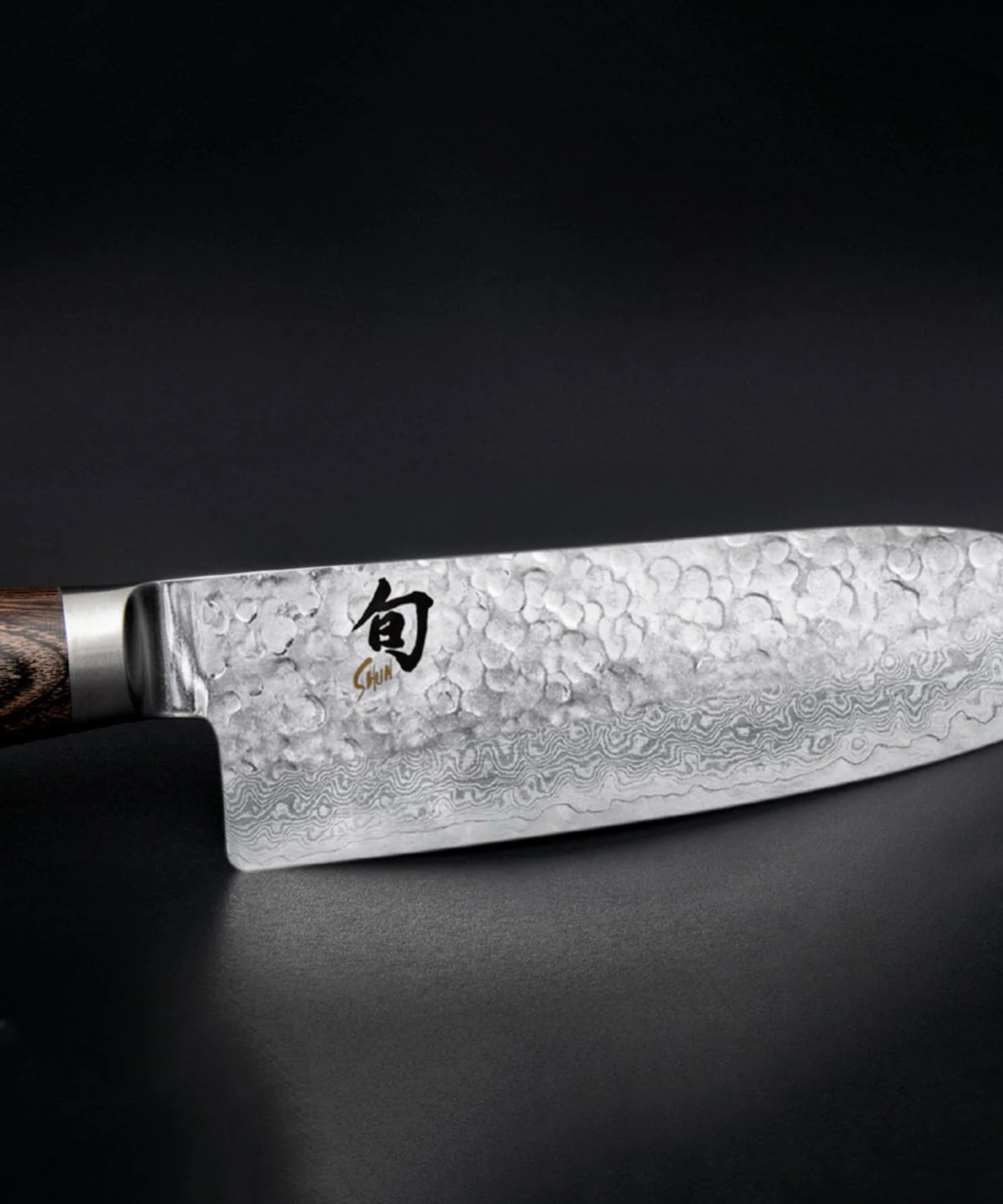 Shun Sankotu knife on a black background