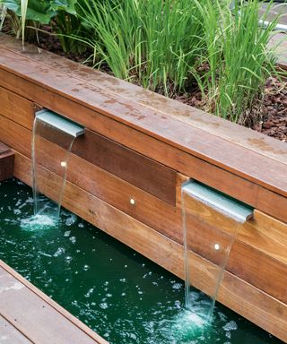 double water feature in raised timber bed