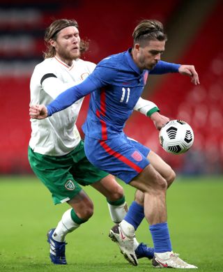 Jack Grealish shields the ball from Republic of Ireland midfielder Jeff Hendrick