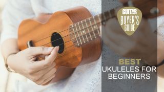 A young woman plays the ukulele