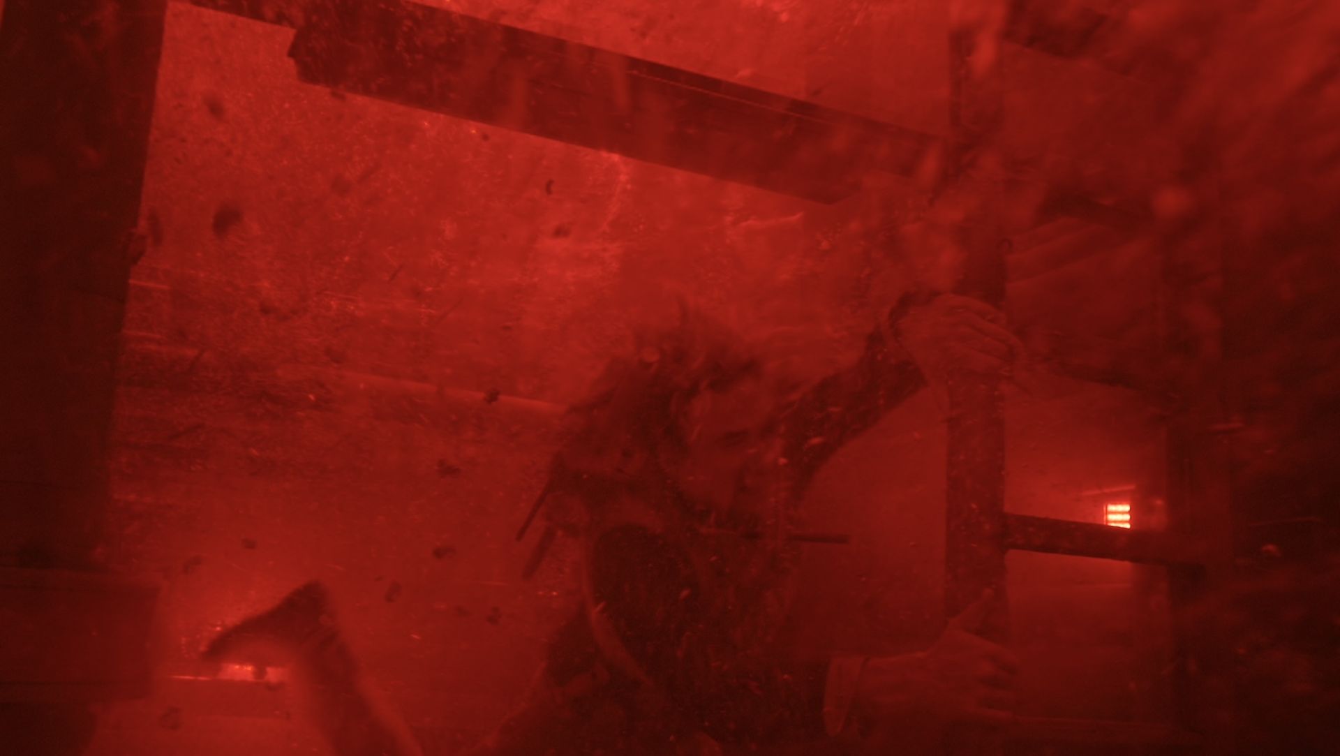 Haymitch under red-tinted water in The Hunger Games: Sunrise on the Reaping