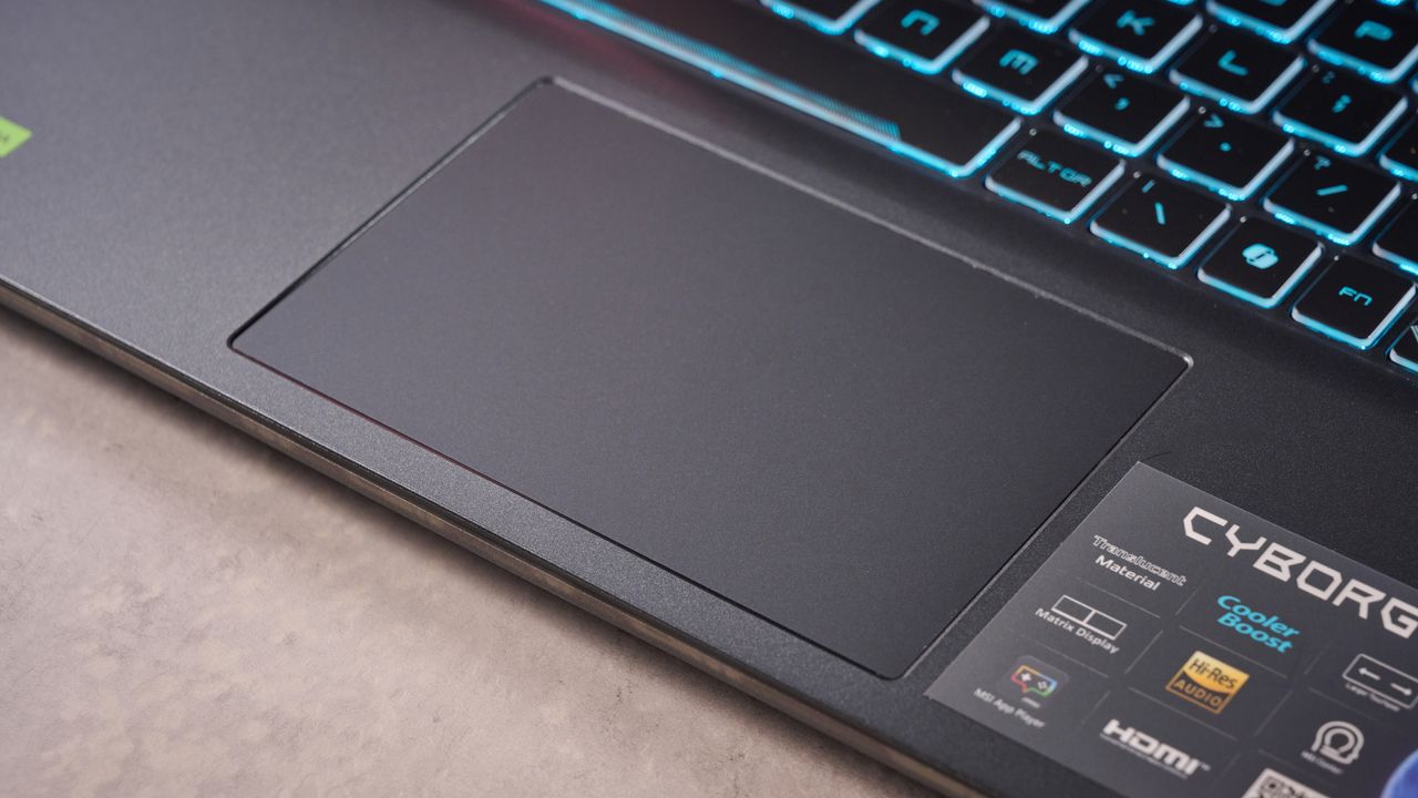 Close-up of touchpad on the MSI Cyborg 15 A13U on a desk
