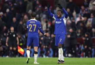Malo Gusto and Axel Disasi of Chelsea celebrate victory at full-time following the Emirates FA Cup Fourth Round Replay match between Aston Villa and Chelsea at Villa Park on February 07, 2024 in Birmingham, England. (Photo by Catherine Ivill/Getty Images)