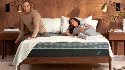 Tuft & Needle Mint Hybrid mattress with two people sleeping