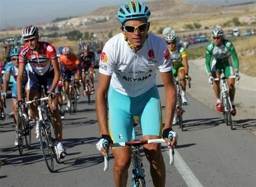 Andrey Kashechkin (Astana) smiles in the white combination jersey during the stage