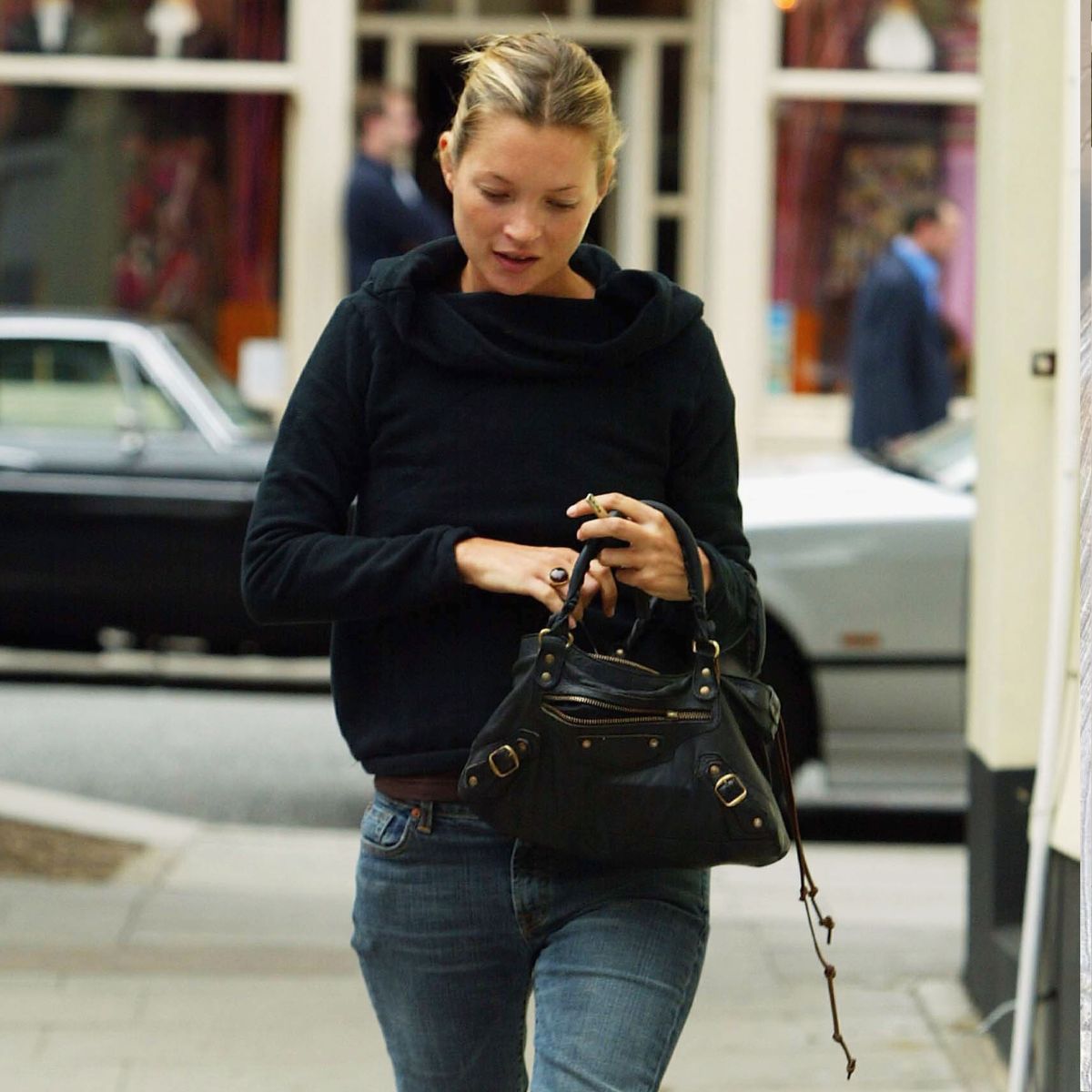An image of Kate Moss wearing slouch boots in 2003.