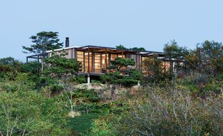 This house is situated on a gentle slope overlooking Cape Cod Bay