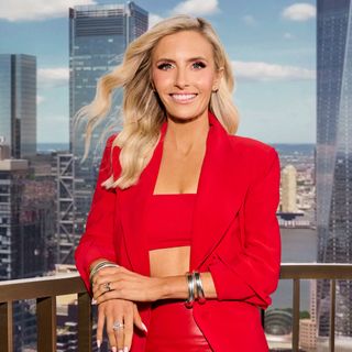 Taylor Middleton wearing a red blazer and crap top in a promo shot of Selling the City S1.