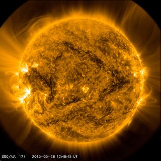 A "seesaw" filament emerged over the sun's surface in this photo taken by NASA's Solar Dynamics Observatory on May 28, 2015.