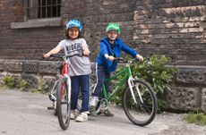 Two kids with woom bikes