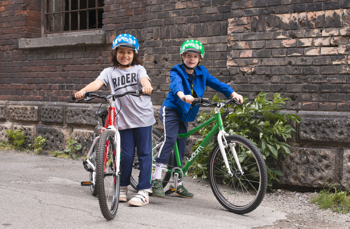 Two kids with woom bikes