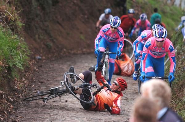 A rider crashes in front of the Lampre-ISD team.