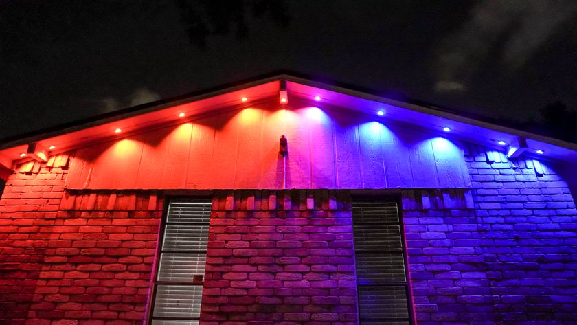 An underhead view showing a roof&#039;s ridge lit with Govee&#039;s Prism permanent outdoor lights