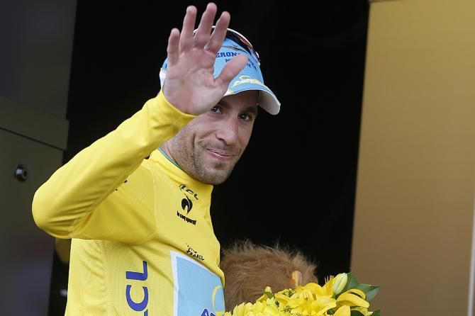 Vincenzo Nibali (Astana) waves goodbye to another day in the maillot jaune