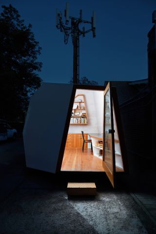 Lighthouse micro-office by night