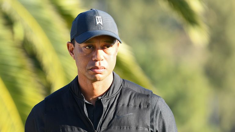 Tiger Woods looks on from the 18th hole during the final round of The Genesis Invitational golf tournament at the Riviera Country Club in Pacific Palisades, CA on February 21, 2021