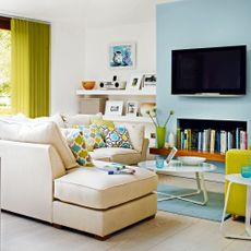 open plan living room with blue wall
