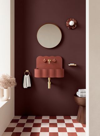 red powder room with scalloped concrete basin