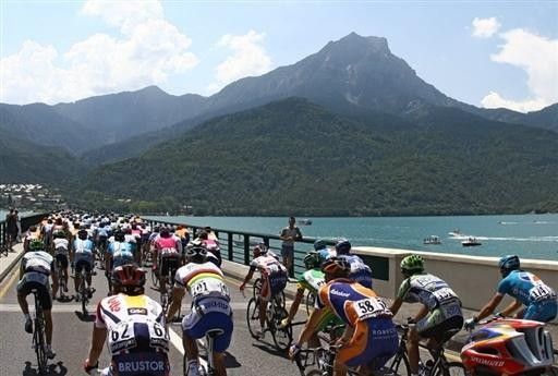 The peloton rides in the early part of the stage