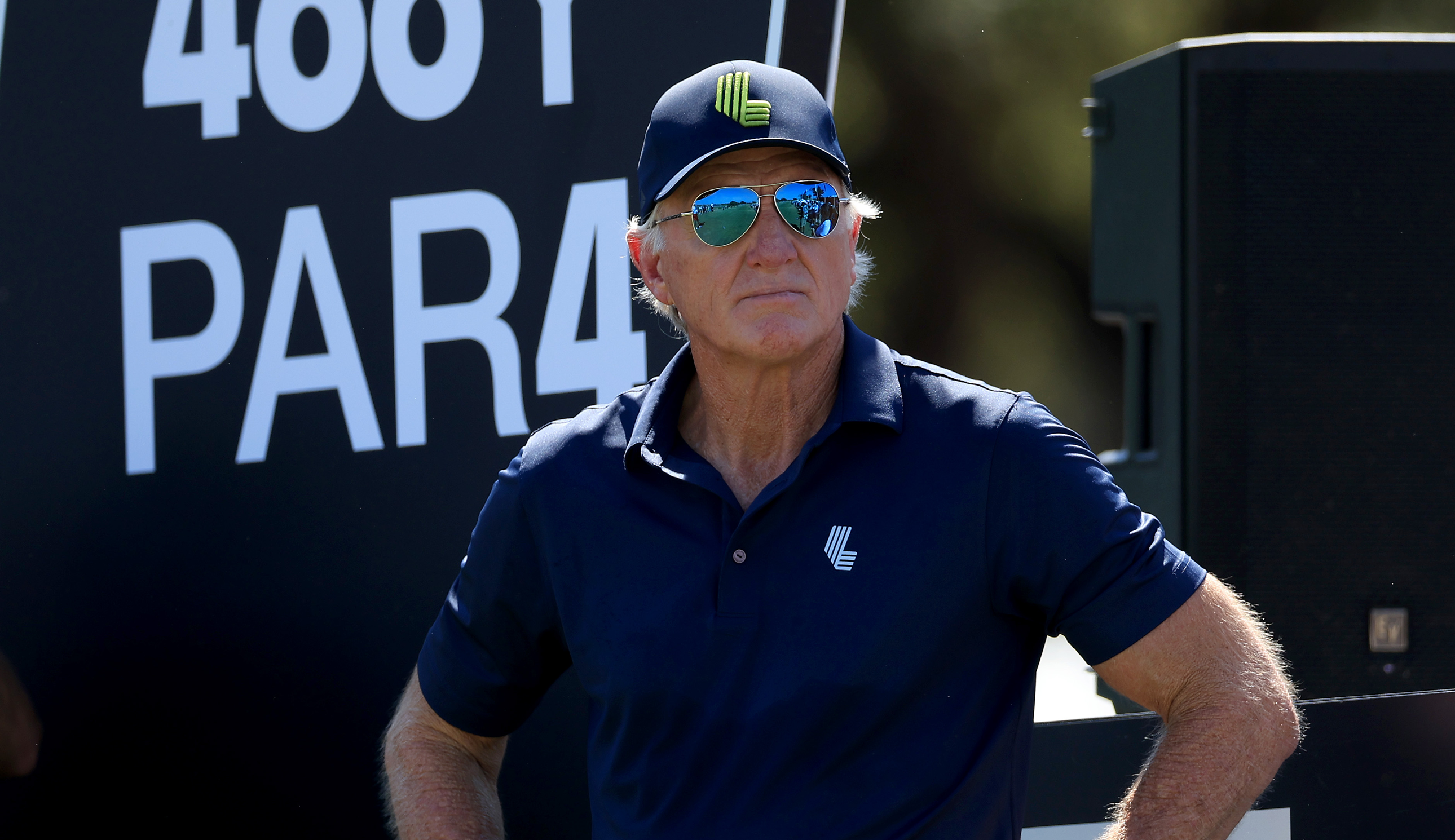 Greg Norman watches on
