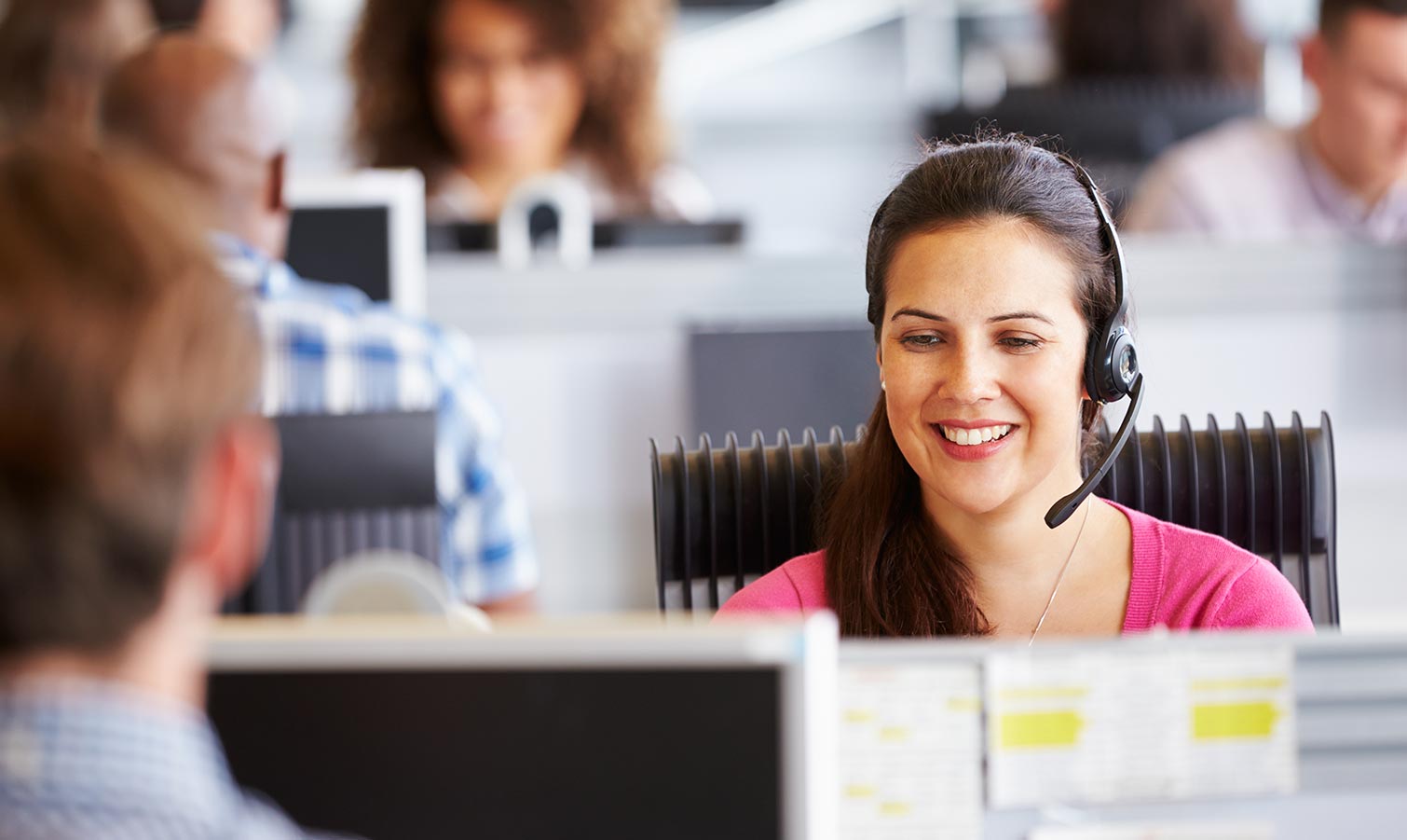 Customer Support Agent on a call wearing a headset