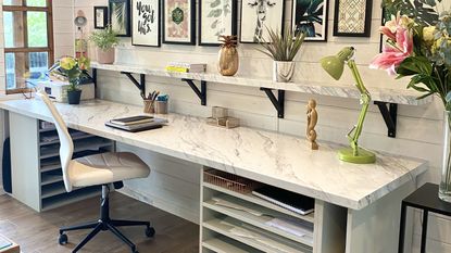 DIY desk ideas for an art studio with a marble effect worktop and built in storage 