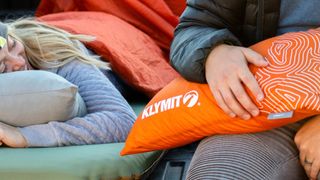 Person using Klymit Drift Camp Pillow