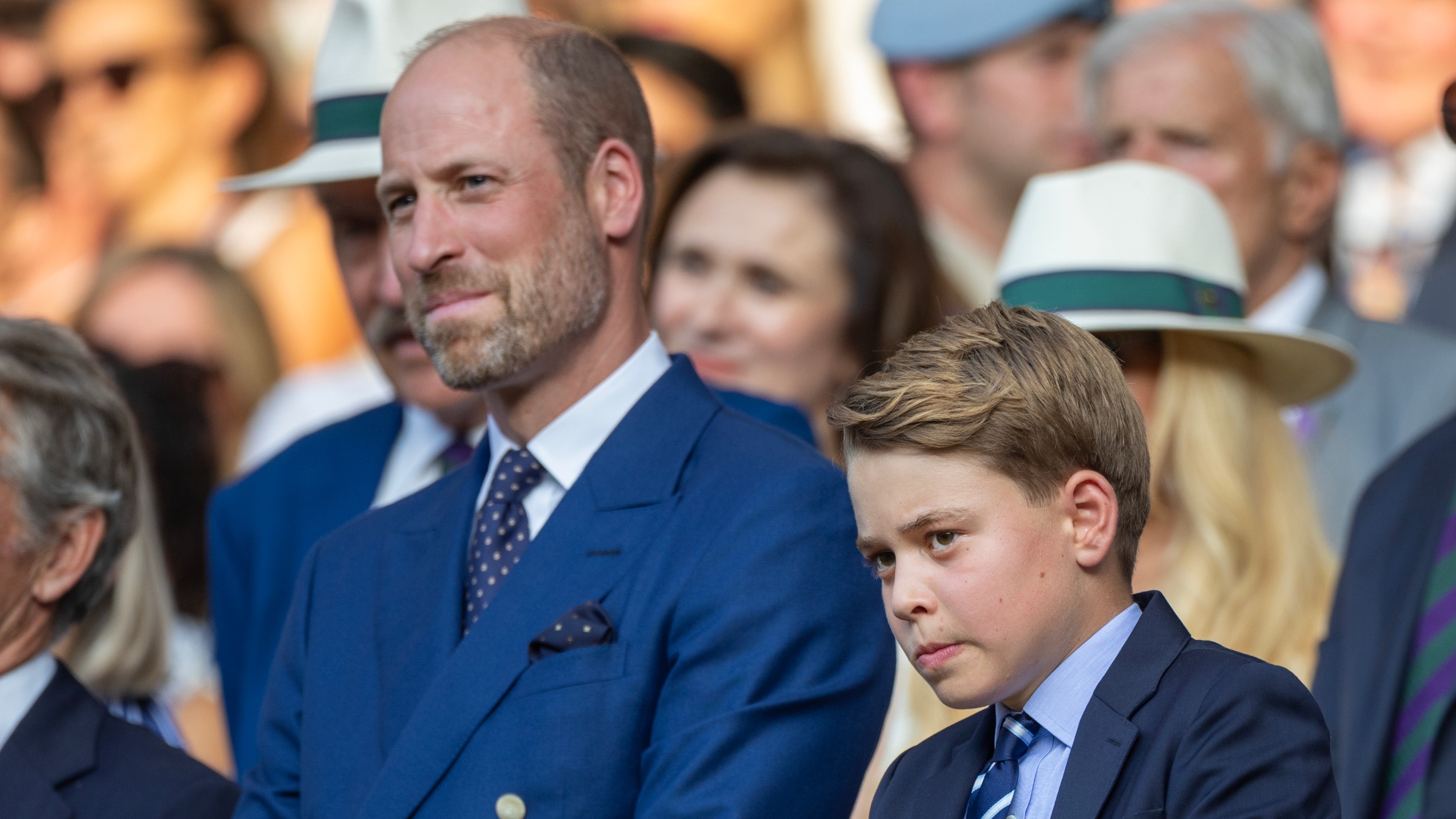 Prince William and Prince George watch the presentation ceremony of the Gentlemen&#039;s Singles Final at Wimbledon 2025