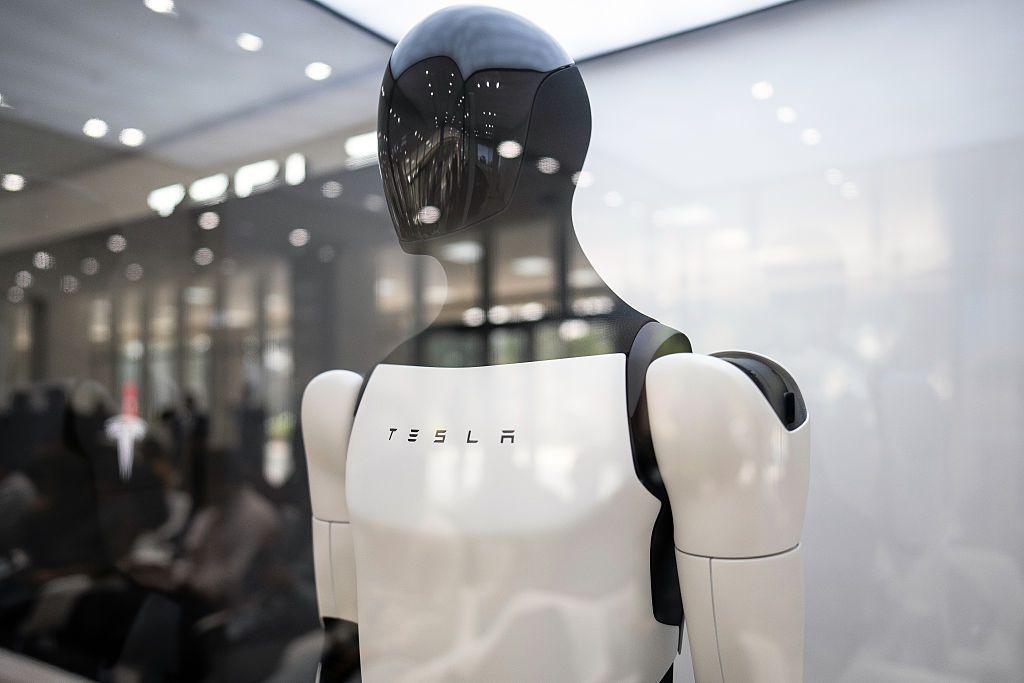 Tesla beats on earnings, but spending plans spook investors