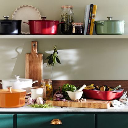 Kitchen with white walls and cookware