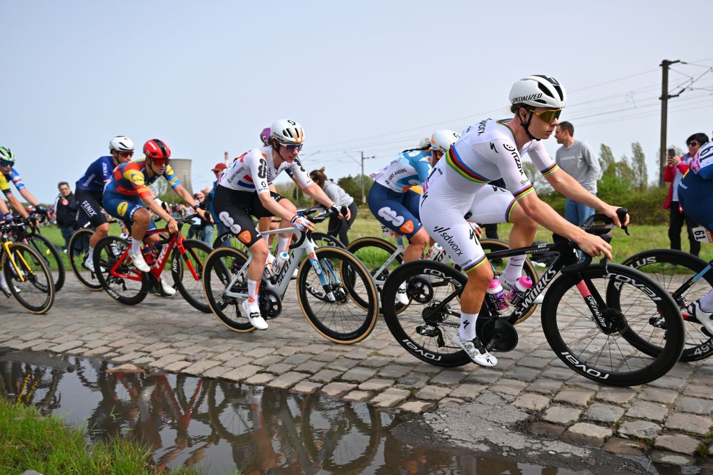 ROUBAIX FRANCE APRIL 06 LR Pfeiffer Georgi of The United Kingdom and Team dsmfirmenich PostNL and Lotte Kopecky of Belgium and Team SD Worx Protime compete passing through the Hornaing a Wandignies cobblestones sector during the 4th ParisRoubaix Femmes 2024 a 1485km one day race from Denain to Roubaix on UCIWWT April 06 2024 in Roubaix France Photo by Luc ClaessenGetty Images