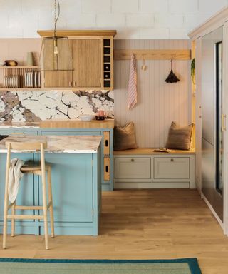 Blue and greige kitchen with two-tone countertops