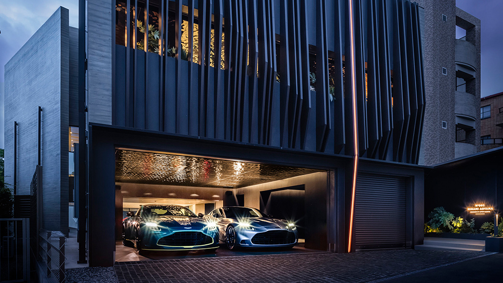 Aston Martin residential development with cars in the garage of a modern-looking building
